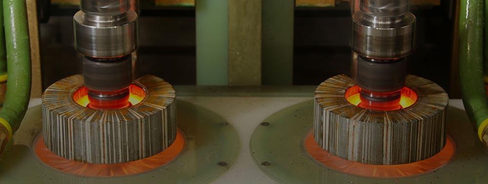 Two cylindrical pieces of equipment used for induction heating solutions for the bar, tube and wire industries.